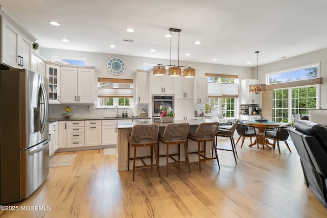 6 Cameron Ct, Forked River, NJ 08731 - kitchen featuring stainless steel appliances, healthy amount of natural light, a breakfast bar area, light wood-style flooring, and recessed lighting