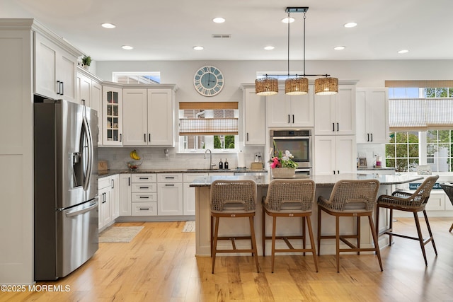 6 Cameron Ct, Forked River, NJ 08731 - kitchen with stainless steel refrigerator with ice dispenser, decorative backsplash, stone counters, and recessed lighting