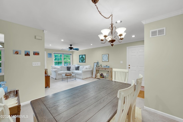 54 Chinkaberry Ct, Howell, NJ 07731 - dining space featuring light carpet, a chandelier, recessed lighting, ceiling fan, and crown molding