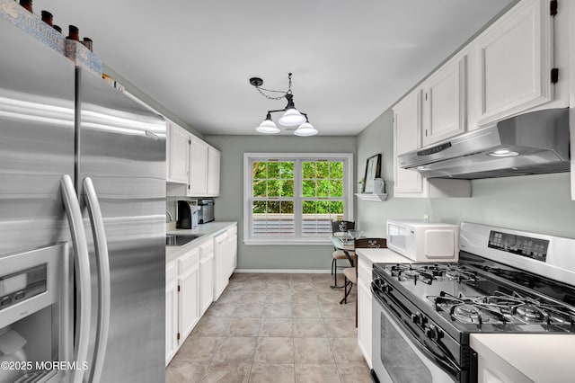 54 Chinkaberry Ct, Howell, NJ 07731 - kitchen with appliances with stainless steel finishes, under cabinet range hood, light countertops, white cabinetry, and hanging light fixtures