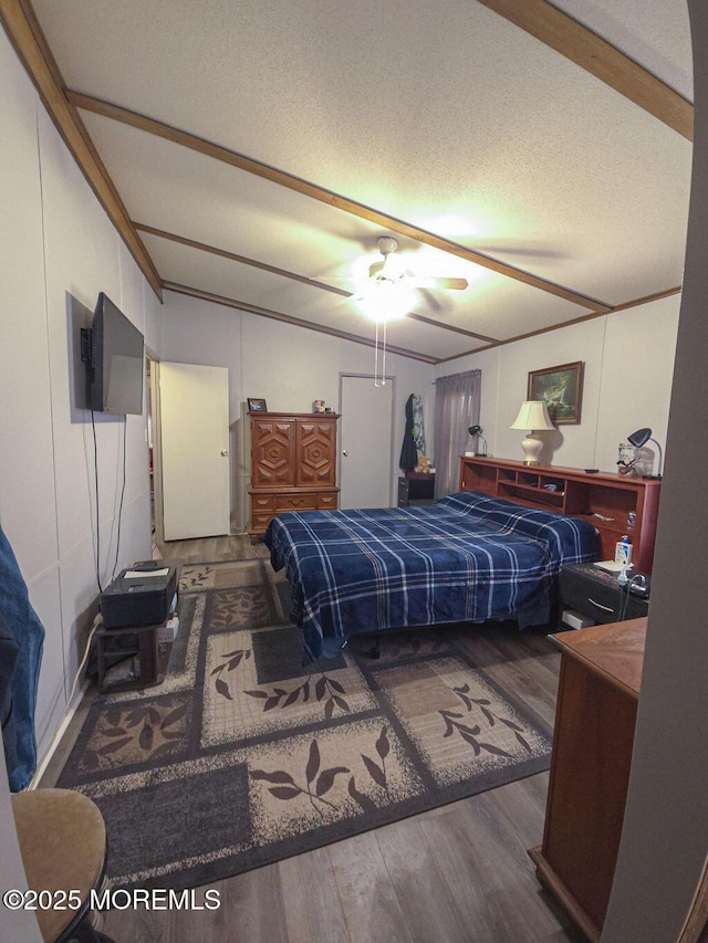 9 Casey Ct, Barnegat, NJ 08005 - bedroom with wood finished floors and a decorative wall