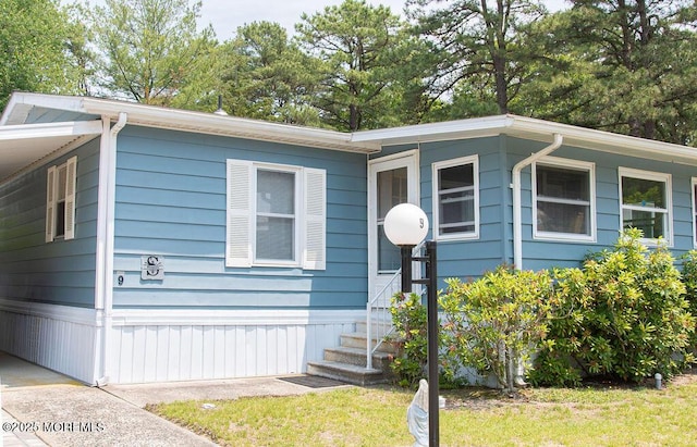 9 Casey Ct, Barnegat, NJ 08005 - manufactured / mobile home featuring a carport