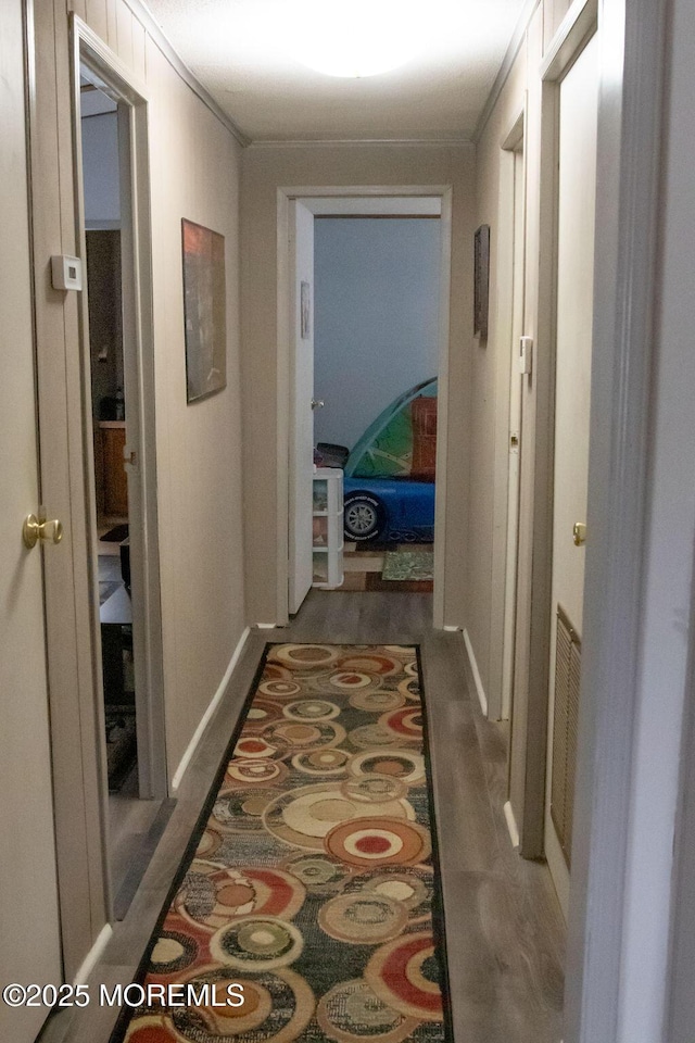 9 Casey Ct, Barnegat, NJ 08005 - hallway with crown molding and wood finished floors