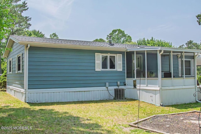 9 Casey Ct, Barnegat, NJ 08005 - back of property featuring a sunroom and a lawn