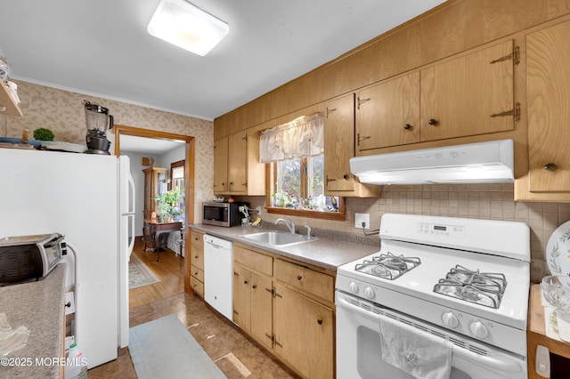 18 Slocum St, West Long Branch, NJ 07764 - kitchen featuring white appliances, under cabinet range hood, tasteful backsplash, wallpapered walls, and light countertops