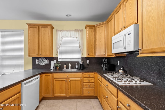 160 Kyle Ct Unit 160, Monroe, NJ 08831 - kitchen with white appliances, light tile patterned flooring, and decorative backsplash