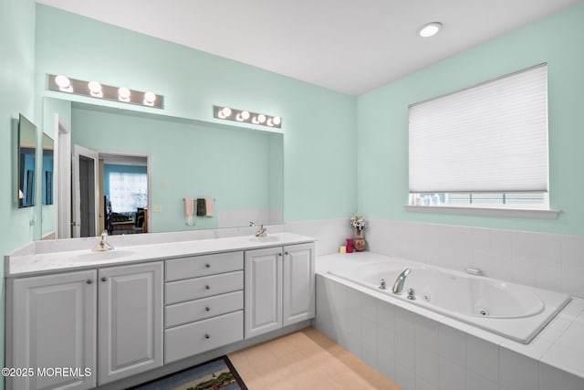 160 Kyle Ct Unit 160, Monroe, NJ 08831 - bathroom featuring double vanity, a jetted tub, and tile patterned flooring