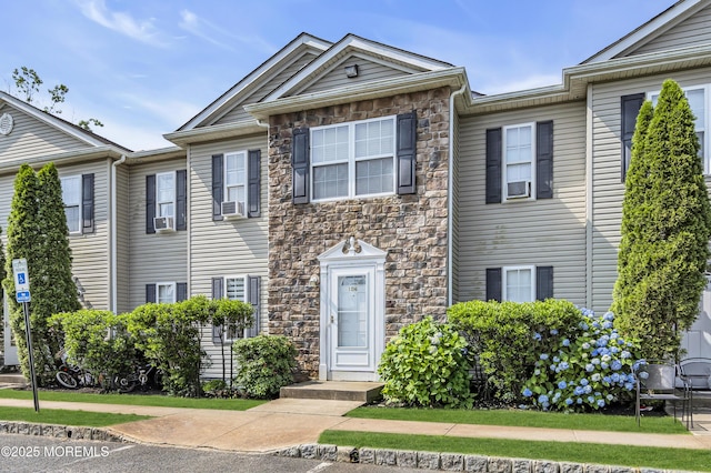 106 Aspen Ct, Lakewood, NJ 08701 - view of property with stone siding and cooling unit