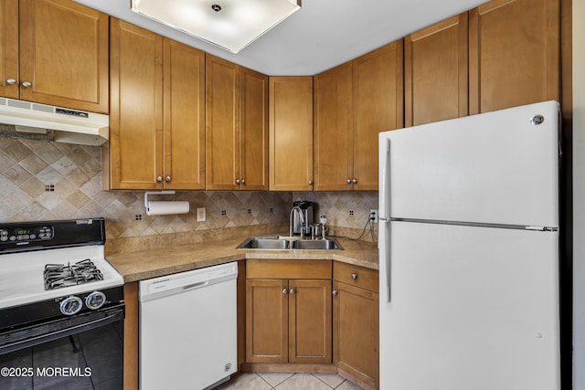 106 Aspen Ct, Lakewood, NJ 08701 - kitchen featuring white appliances, under cabinet range hood, light tile patterned flooring, light countertops, and backsplash