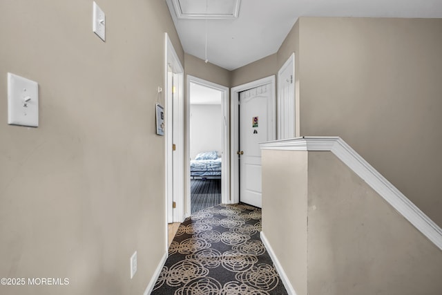 106 Aspen Ct, Lakewood, NJ 08701 - hallway with attic access and baseboards