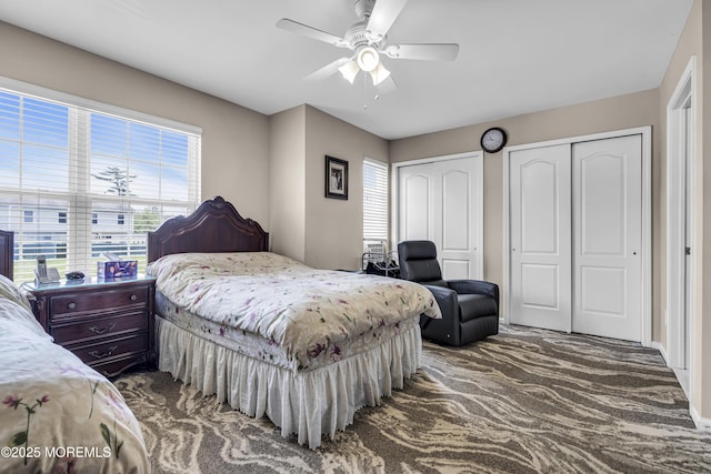 106 Aspen Ct, Lakewood, NJ 08701 - bedroom with carpet, multiple closets, and a ceiling fan