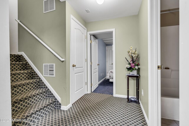 106 Aspen Ct, Lakewood, NJ 08701 - stairway featuring carpet flooring and baseboards