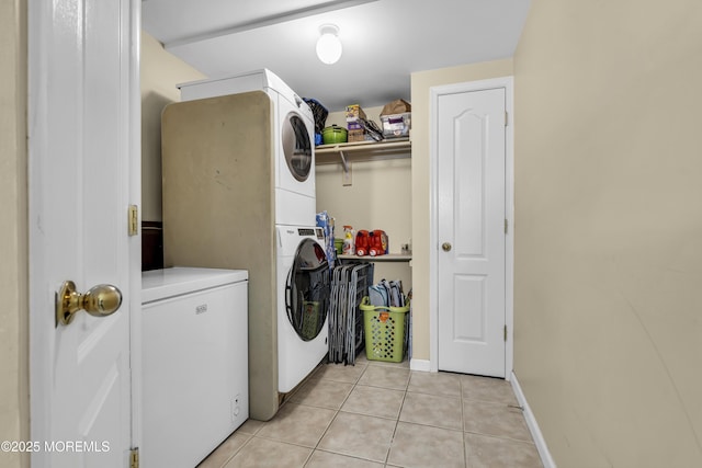 106 Aspen Ct, Lakewood, NJ 08701 - washroom featuring stacked washer / dryer and light tile patterned floors