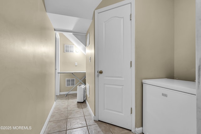 106 Aspen Ct, Lakewood, NJ 08701 - laundry room featuring baseboards and light tile patterned floors