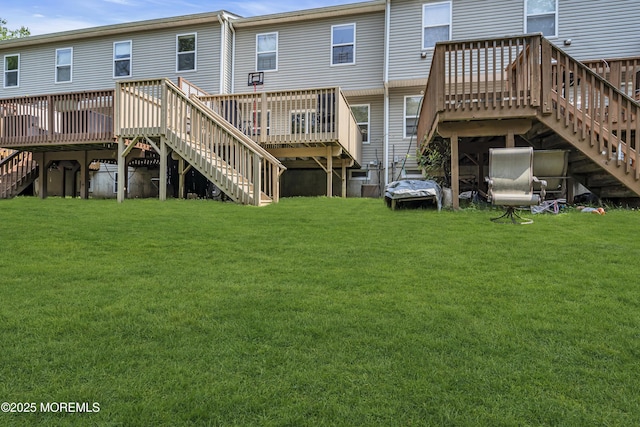 106 Aspen Ct, Lakewood, NJ 08701 - back of house featuring stairway, a wooden deck, and a yard