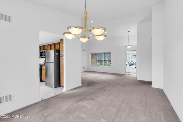 1091A Canterbury Dr, Manchester, NJ 08759 - unfurnished living room featuring light carpet, a chandelier, and recessed lighting