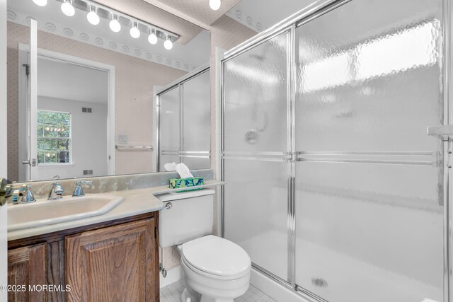 1091A Canterbury Dr, Manchester, NJ 08759 - full bathroom with wallpapered walls, vanity, an enclosed shower, and tile patterned floors