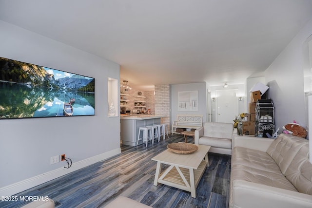 675 Ocean Ave Unit 5J, Long Branch, NJ 07740 - living room with wood finished floors and brick wall