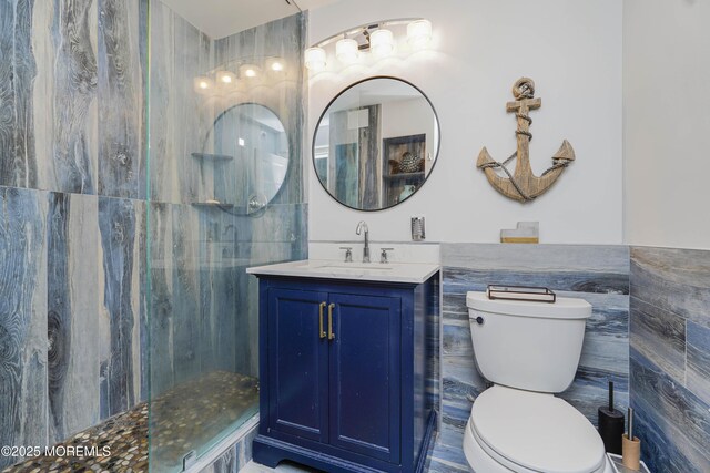 675 Ocean Ave Unit 5J, Long Branch, NJ 07740 - bathroom featuring vanity and walk in shower
