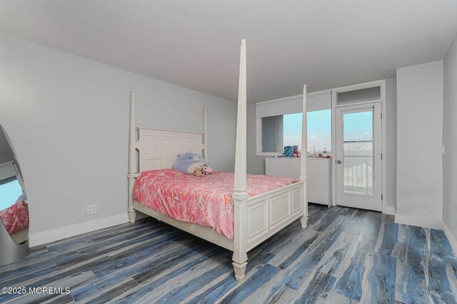 675 Ocean Ave Unit 5J, Long Branch, NJ 07740 - bedroom featuring dark wood-type flooring and access to outside