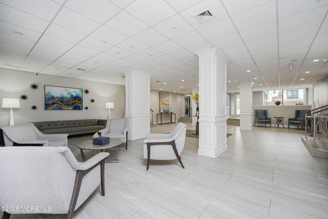 675 Ocean Ave Unit 5J, Long Branch, NJ 07740 - living room with ornate columns, a paneled ceiling, and recessed lighting