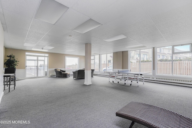 675 Ocean Ave Unit 5J, Long Branch, NJ 07740 - interior space featuring carpet, a paneled ceiling, wainscoting, and a baseboard radiator