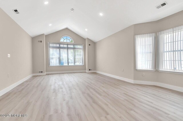 31 Orleans Dr, Manchester, NJ 08759 - empty room featuring vaulted ceiling, light wood-style flooring, and recessed lighting