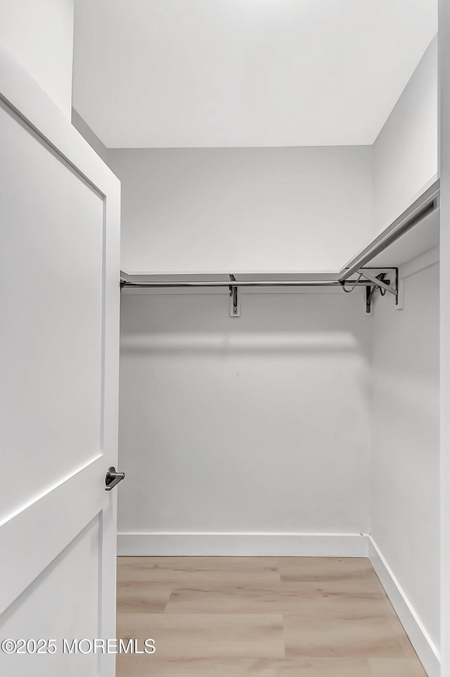 31 Orleans Dr, Manchester, NJ 08759 - walk in closet featuring light wood-type flooring