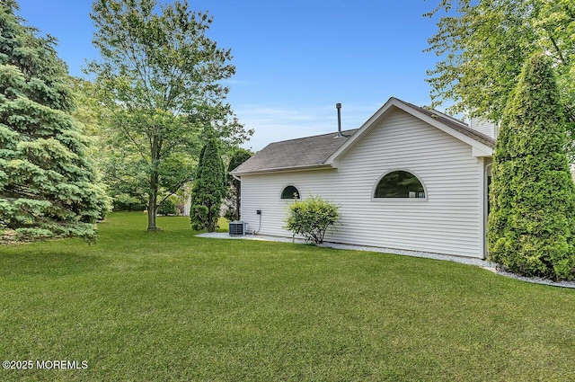 31 Orleans Dr, Manchester, NJ 08759 - view of home's exterior with a lawn and roof with shingles