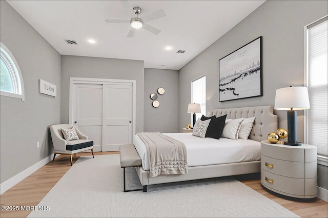 31 Orleans Dr, Manchester, NJ 08759 - bedroom with light wood-type flooring, multiple windows, and ceiling fan