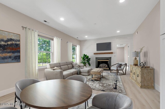31 Orleans Dr, Manchester, NJ 08759 - living area featuring light wood-type flooring, recessed lighting, and a glass covered fireplace