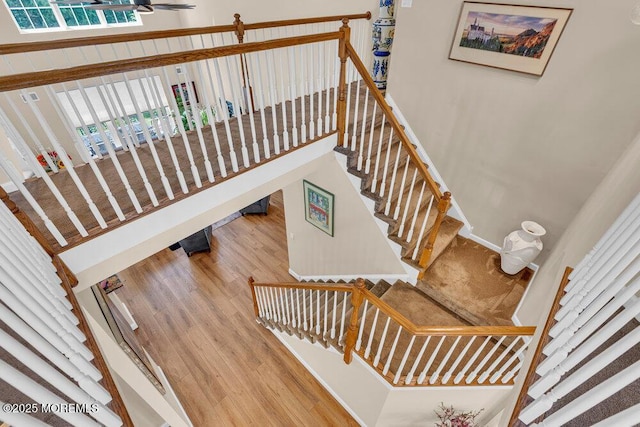 19 Carleton Dr, Freehold, NJ 07728 - stairway with wood finished floors and a ceiling fan