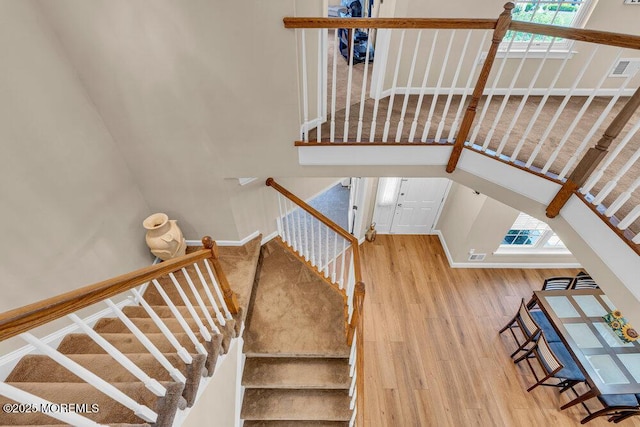19 Carleton Dr, Freehold, NJ 07728 - stairway with wood finished floors and baseboards