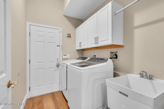 19 Carleton Dr, Freehold, NJ 07728 - washroom featuring cabinet space, washer and clothes dryer, and light wood-style flooring