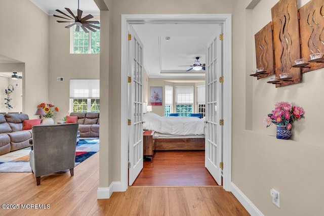 19 Carleton Dr, Freehold, NJ 07728 - hall featuring plenty of natural light, wood finished floors, and french doors