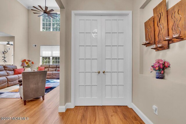 19 Carleton Dr, Freehold, NJ 07728 - entrance foyer with ceiling fan, light wood-type flooring, and a high ceiling