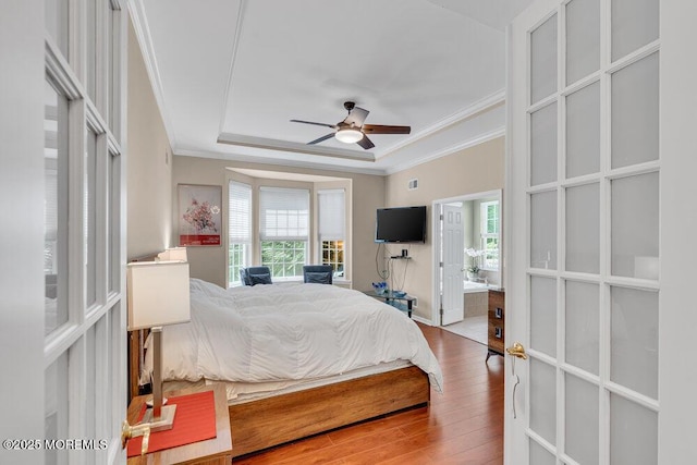 19 Carleton Dr, Freehold, NJ 07728 - bedroom featuring crown molding, multiple windows, hardwood / wood-style flooring, a tray ceiling, and ensuite bathroom
