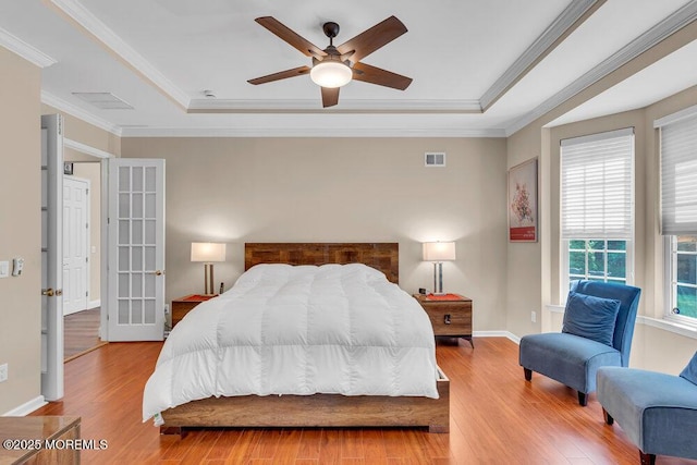 19 Carleton Dr, Freehold, NJ 07728 - bedroom featuring a tray ceiling, wood finished floors, crown molding, and a ceiling fan