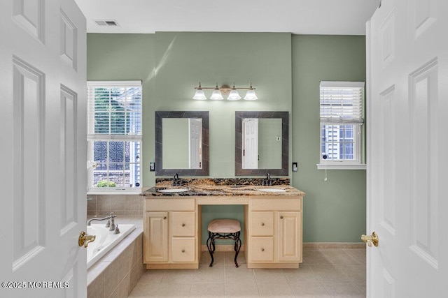 19 Carleton Dr, Freehold, NJ 07728 - bathroom with double vanity, a garden tub, and tile patterned floors