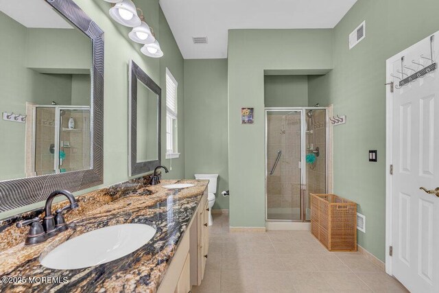 19 Carleton Dr, Freehold, NJ 07728 - bathroom featuring a stall shower, double vanity, and tile patterned flooring