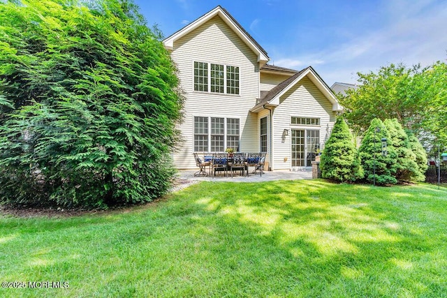 19 Carleton Dr, Freehold, NJ 07728 - rear view of house with a patio area and a yard