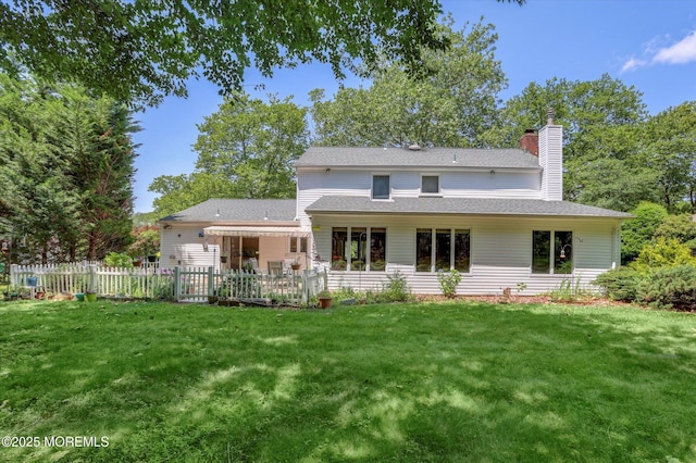 7 Owens Rd, Marlboro, NJ 07746 - rear view of property with a chimney, a shingled roof, and a patio area
