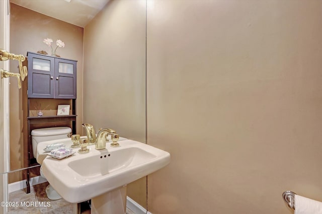7 Owens Rd, Marlboro, NJ 07746 - half bathroom featuring toilet and tile patterned flooring