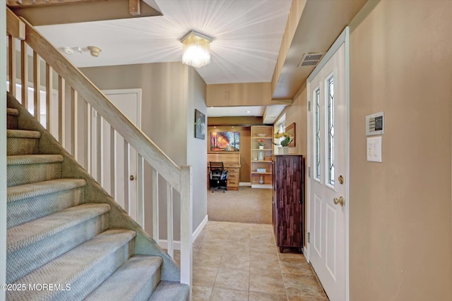7 Owens Rd, Marlboro, NJ 07746 - entrance foyer with light carpet, stairs, and light tile patterned floors