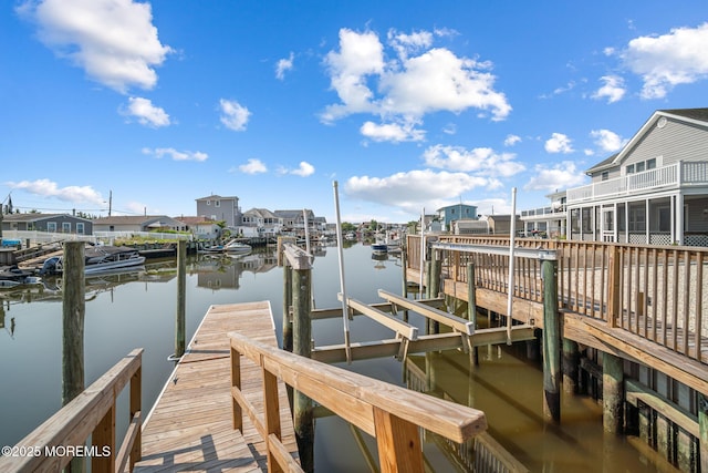 1 S Ensign Dr, Little Egg Harbor, NJ 08087 - dock area featuring a water view, boat lift, and a residential view