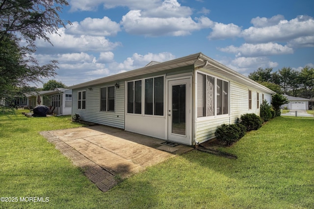 11 Garland Dr, Brick, NJ 08724 - back of property with a lawn and a patio