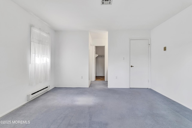 11 Garland Dr, Brick, NJ 08724 - unfurnished bedroom with a baseboard radiator, carpet flooring, and a spacious closet