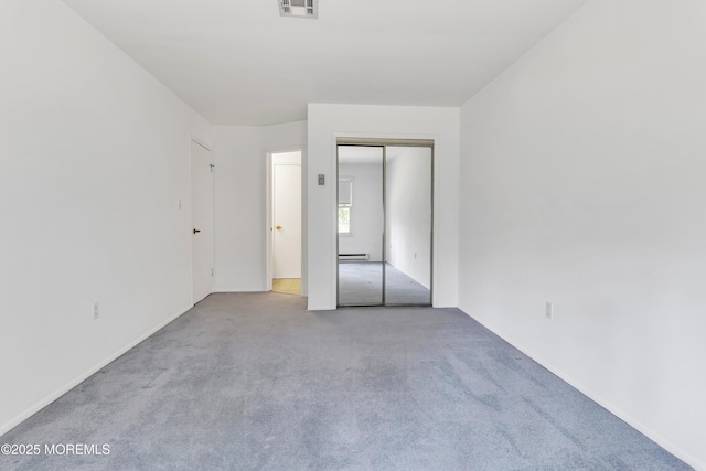 11 Garland Dr, Brick, NJ 08724 - unfurnished bedroom featuring carpet, baseboard heating, and a closet