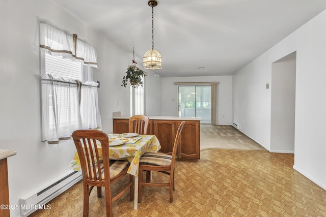 11 Garland Dr, Brick, NJ 08724 - dining space featuring a baseboard radiator, light flooring, and light carpet