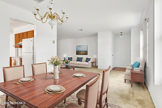 11 Garland Dr, Brick, NJ 08724 - dining room featuring a chandelier and baseboards